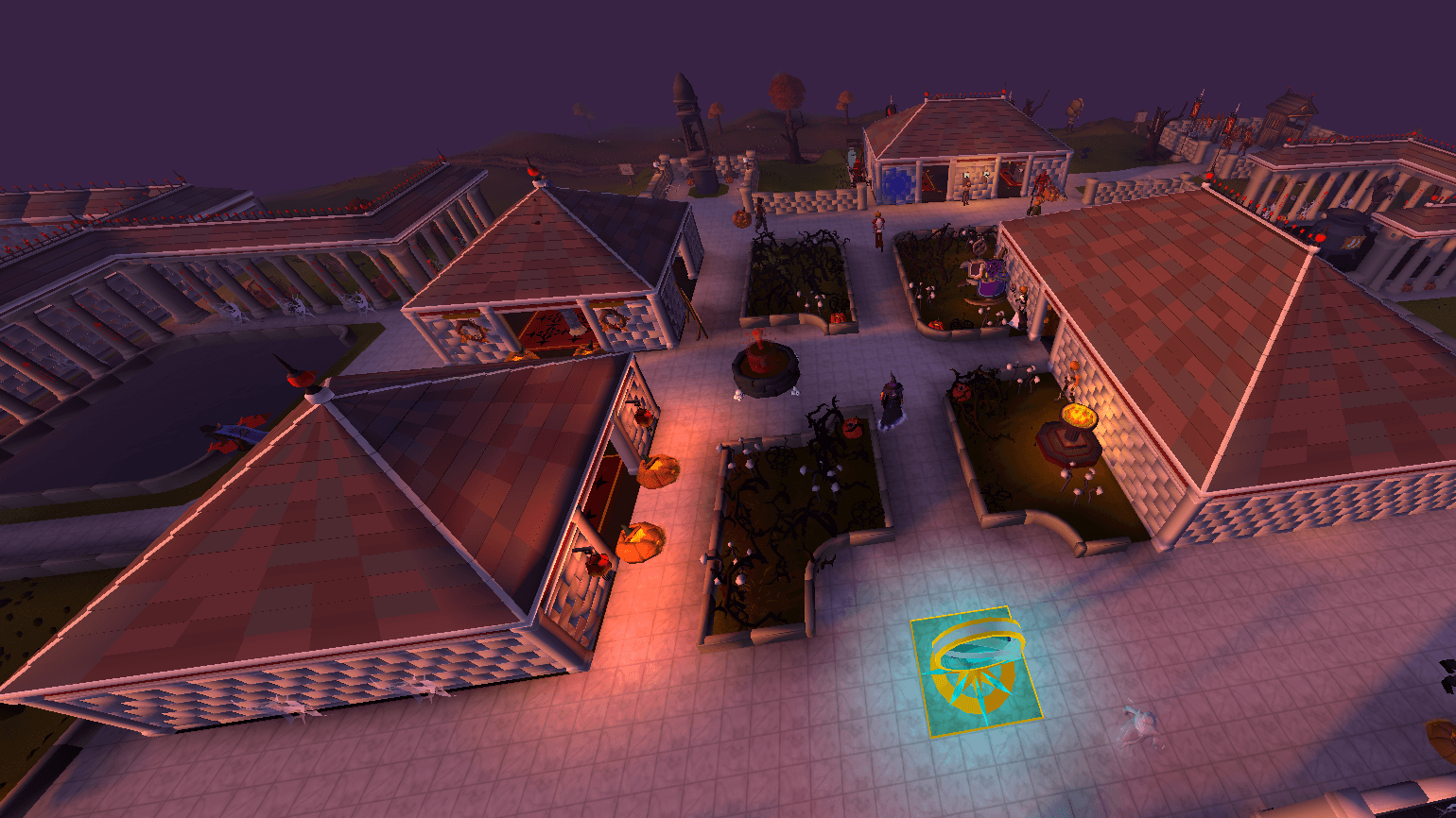 Home from above at dusk, the new slate roofs on the four plaza buildings around the Halloween gardens